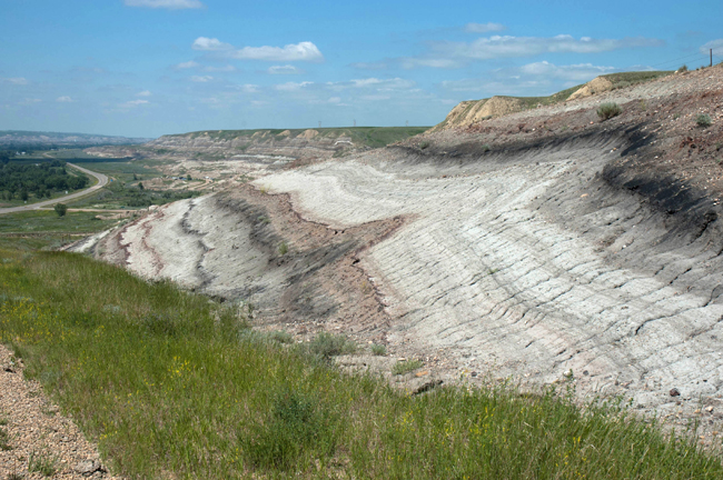 Glacial drag fold in bedrock, road cut, Hwy 573, east of Willow Creek Hoodoos, SE of Rosedale, Alberta